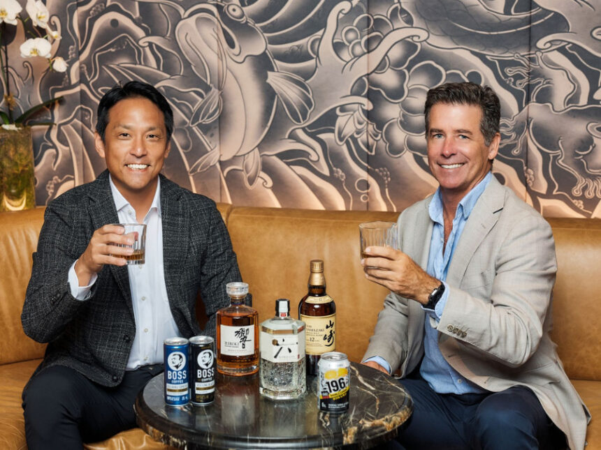 Incoming CEO Daisuke Minato next to departing CEO Darren Fullerton