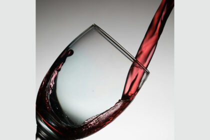 Red wine being poured into a glass