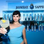 Rebecca Black with a branded Bombay Sapphire glass