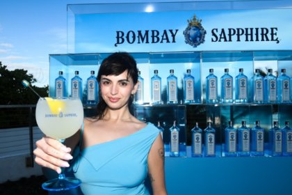 Rebecca Black with a branded Bombay Sapphire glass