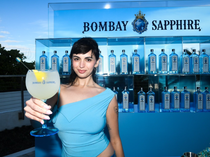 Rebecca Black with a branded Bombay Sapphire glass