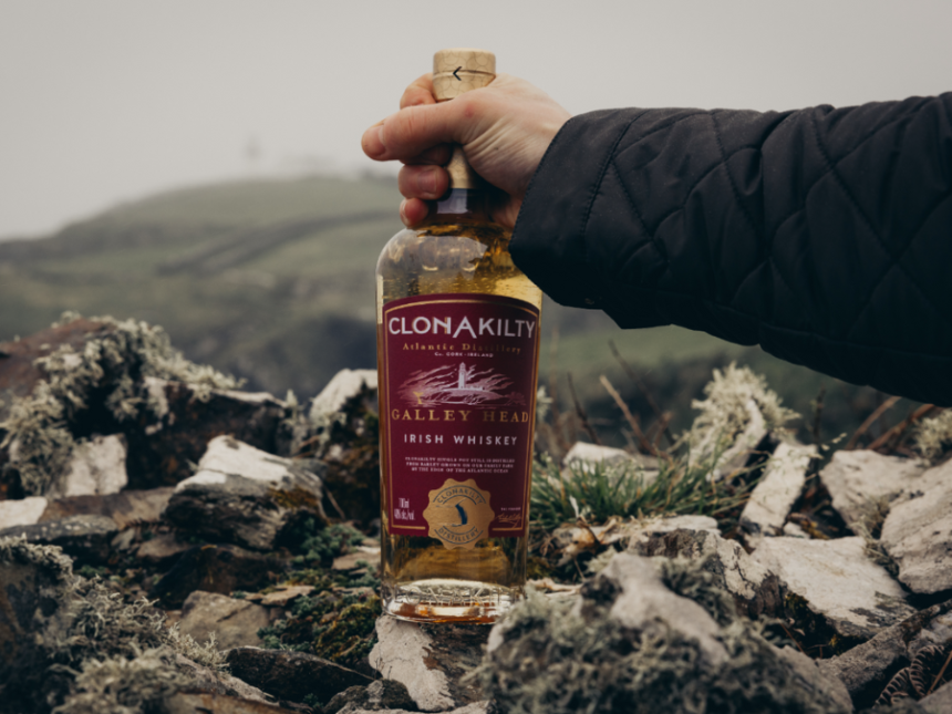 Clonakilty Irish whiskey bottle being held