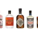 Bottles of Woodburns Contemporary Indian Whisky, Pumori Small Batch Gin and Segredo Aldeia Rum
