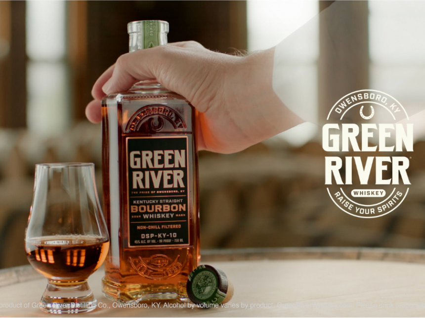 Green River whiskey bottle held by ghost's hand next to serve