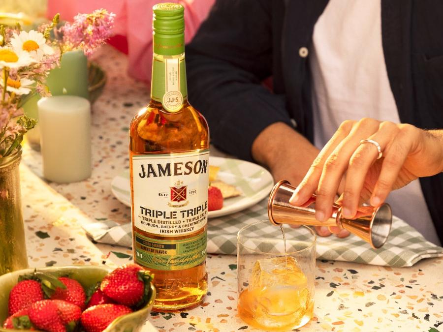 Bottle of Jameson Triple Triple next to shot poured into glass