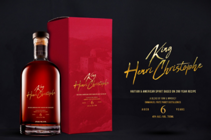 King Henri Christophe whiskey bottle next to box and text