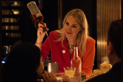 Holly Graham preparing a cocktail in a bar