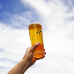 Branded glass of North Brewing beer