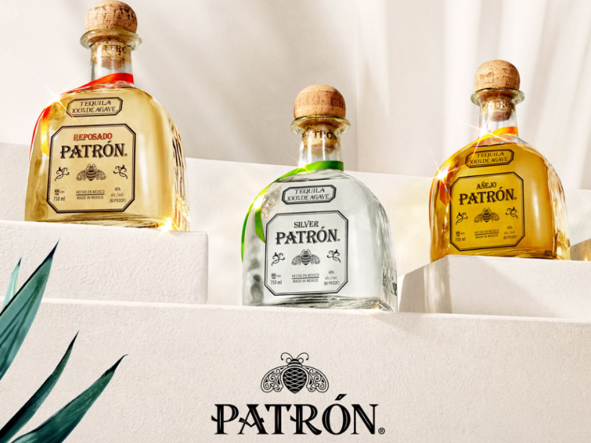 Three Patron tequila bottles on steps