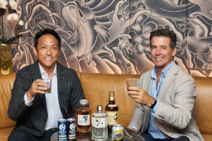 Incoming CEO Daisuke Minato next to departing CEO Darren Fullerton