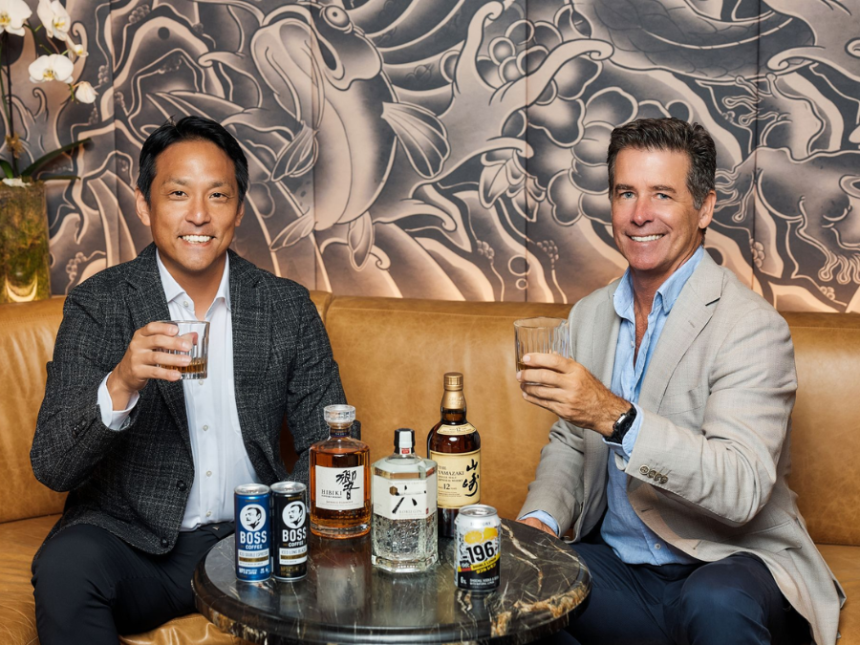 Incoming CEO Daisuke Minato next to departing CEO Darren Fullerton