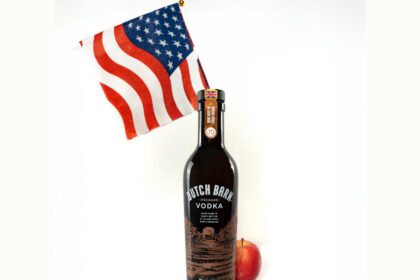 Dutch Barn vodka bottle with US flag and an apple
