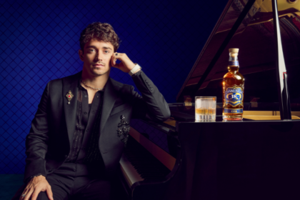 Charles Leclerc next to piano with Chivas Regal bottle and serve
