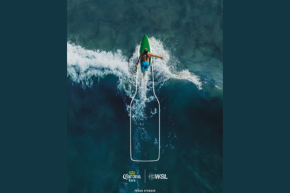 Man surfing with Corona bottle design