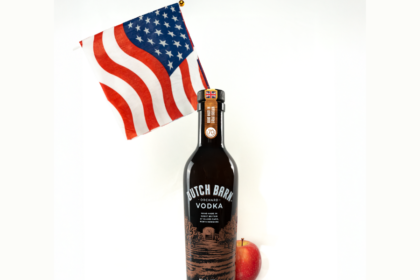 Dutch Barn vodka bottle with US flag and an apple