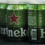 Cans of Heineken on a production line