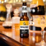 Hofmeister bottle atop bar