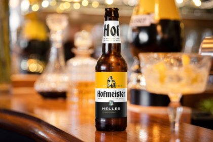Hofmeister bottle atop bar