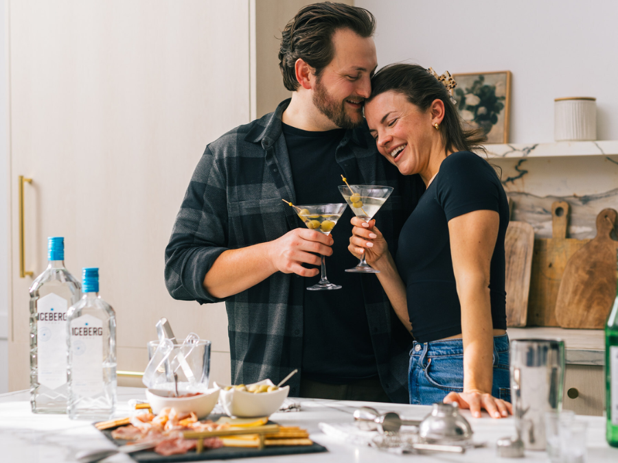 Two people with Iceberg Vodka cocktails