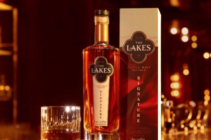 Lakes Distillery Signature bottle next to box and serve