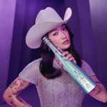 Peggy Gou poses with limited-edition Don Julio bottle