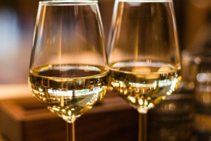 Close-up of two glasses of white wine