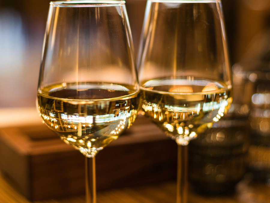 Close-up of two glasses of white wine