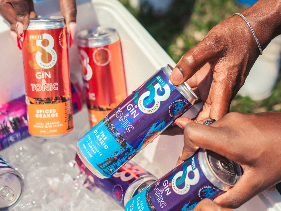 African Originals Gin & Tonic cans in ice box