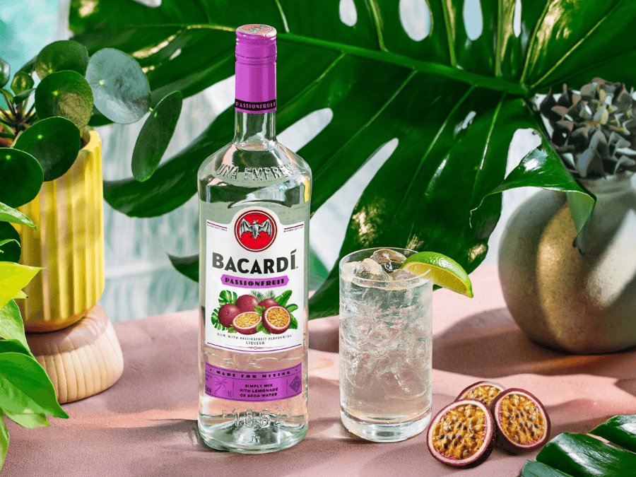 Bacardi Passionfruit bottle next to serve and passionfruits