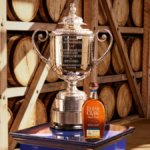 PGA Championship trophy next to Elijah Craig bottle