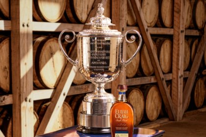 PGA Championship trophy next to Elijah Craig bottle