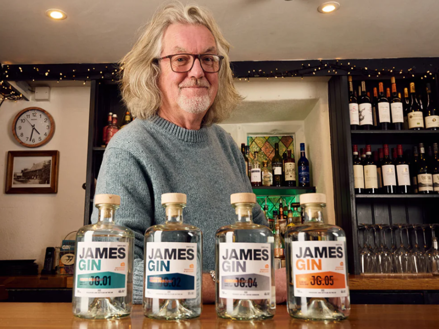 James May next to lineup of James Gin bottles