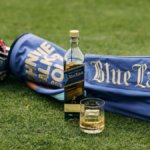 Johnnie Walker Blue Label bottle and golf bag