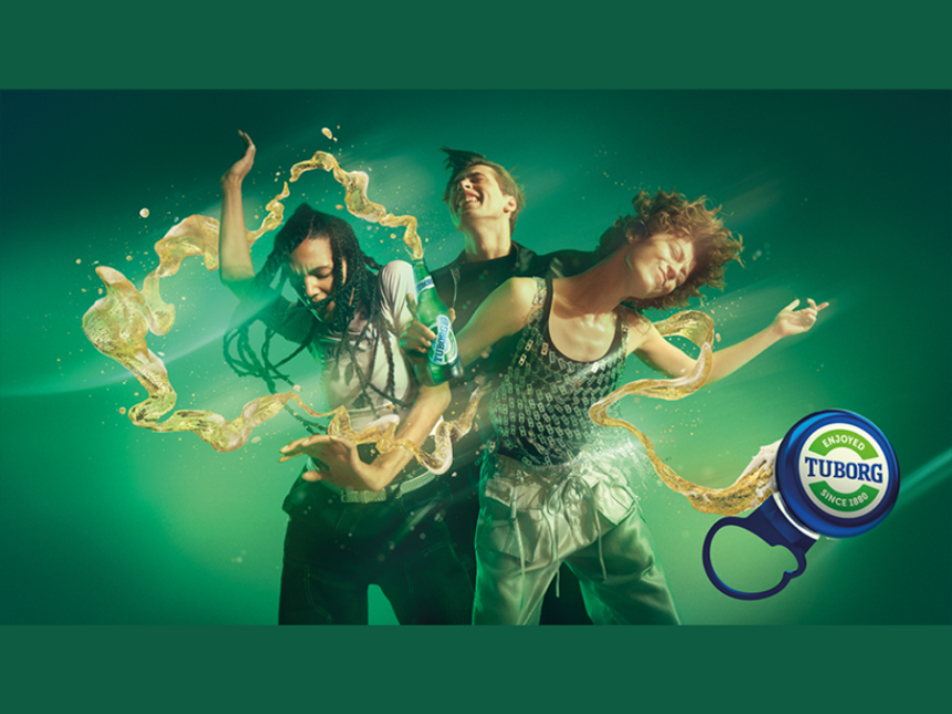 People dancing with Tuborg bottle cap to the side