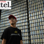 Anheuser-Busch employee in front of pallets of emergency water