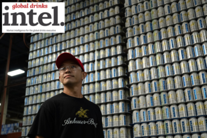 Anheuser-Busch employee in front of pallets of emergency water