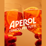Aperol Spritz serves clinking for campaign