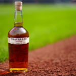 Traveller Whiskey bottle on baseball pitch
