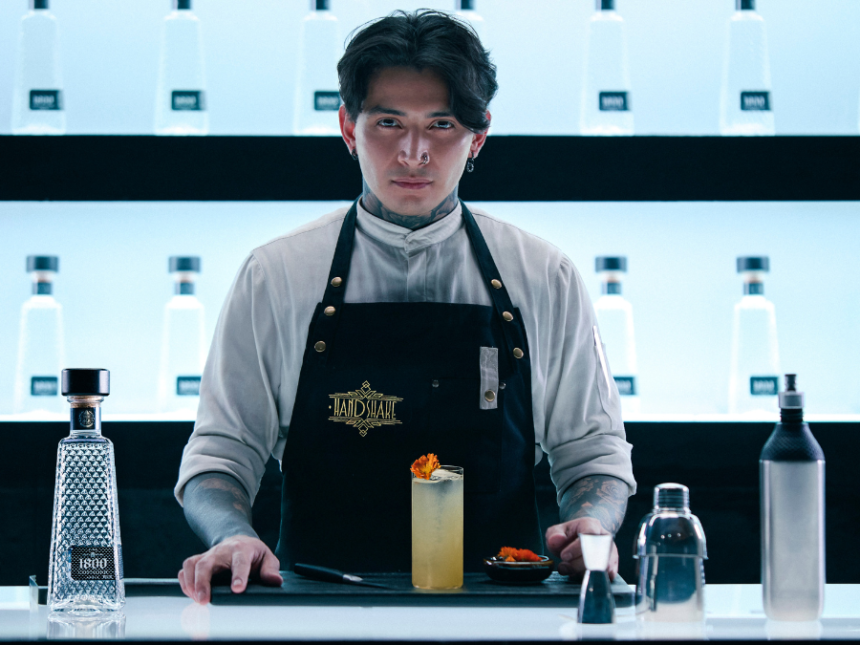 Bartender Javier Rodriguez from Handshake with 1800 Tequila bottle