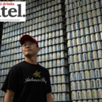 Anheuser-Busch employee in front of pallets of emergency water