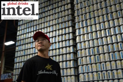 Anheuser-Busch employee in front of pallets of emergency water