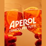 Aperol Spritz serves clinking for campaign