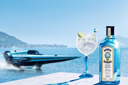 Bombay Sapphire bottle and serve with E1 boat on water