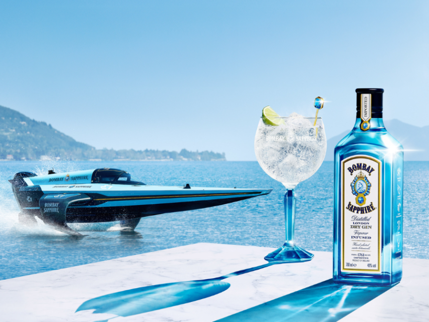 Bombay Sapphire bottle and serve with E1 boat on water