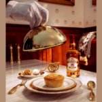 Chivas Regal bottle next to to a pie