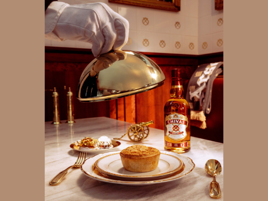 Chivas Regal bottle next to to a pie