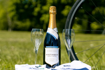 Nyetimber bottle in front of bike