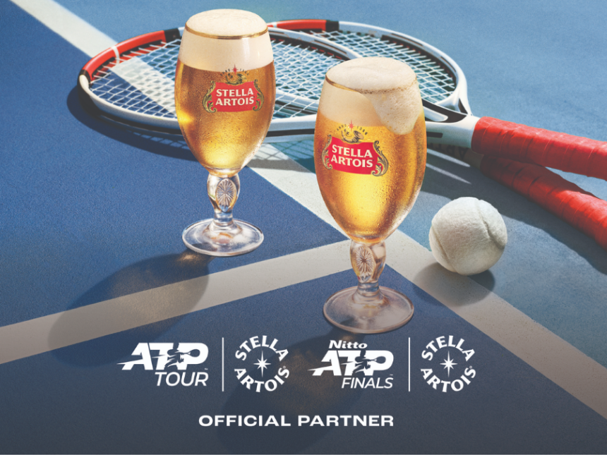 Stella Artois pint serves next to tennis rackets