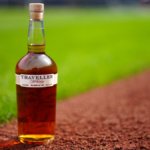 Traveller Whiskey bottle on baseball pitch