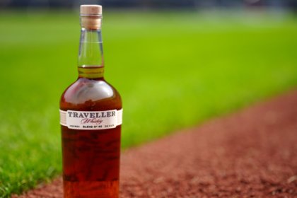 Traveller Whiskey bottle on baseball pitch